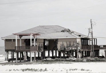 Wind damage - spray foam can help prevent uplift to Cheyenne roofs